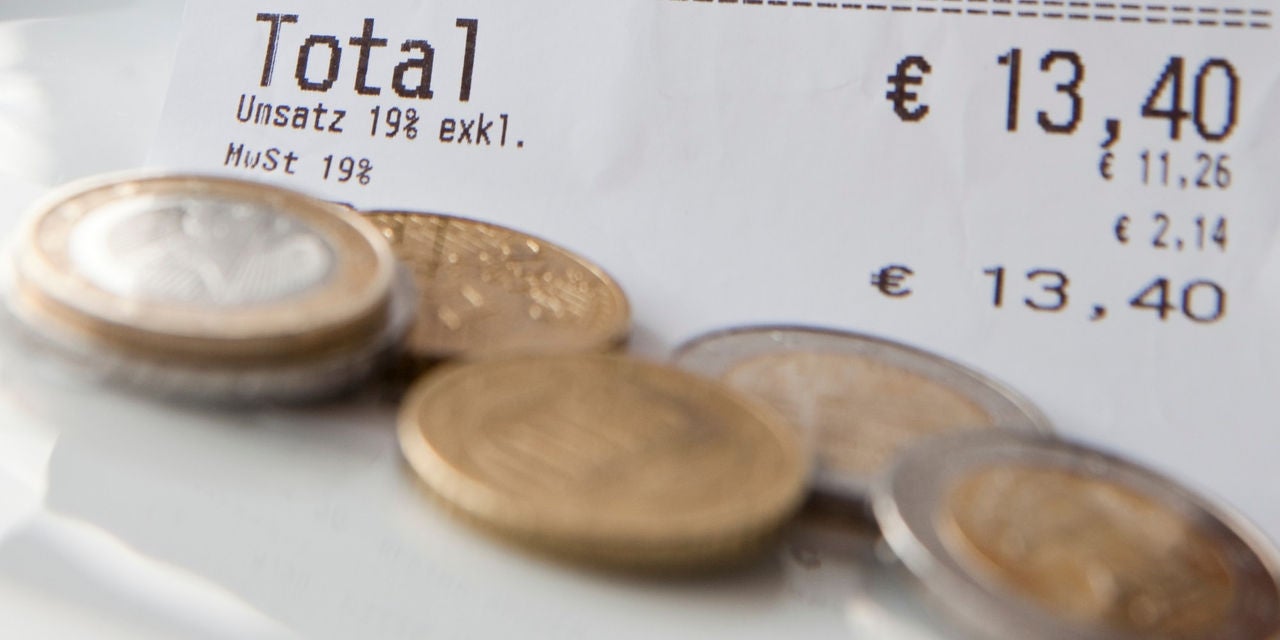 Euro coins on an invoice